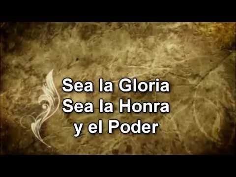 al que esta sentado en el trono letra